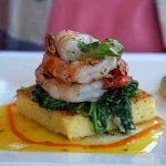 Polenta square with shrimps on top