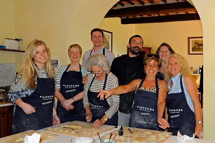 Kathryn Burrington cooking with our guests in Tuscany