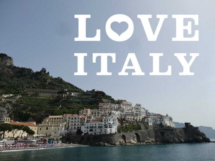 Breathtaking view of the Amalfi coast and a love Italy banner