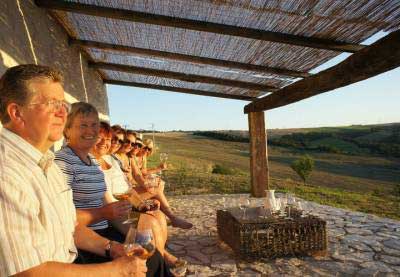 Group of travellers on a single holiday enjoying Tuscan landscape