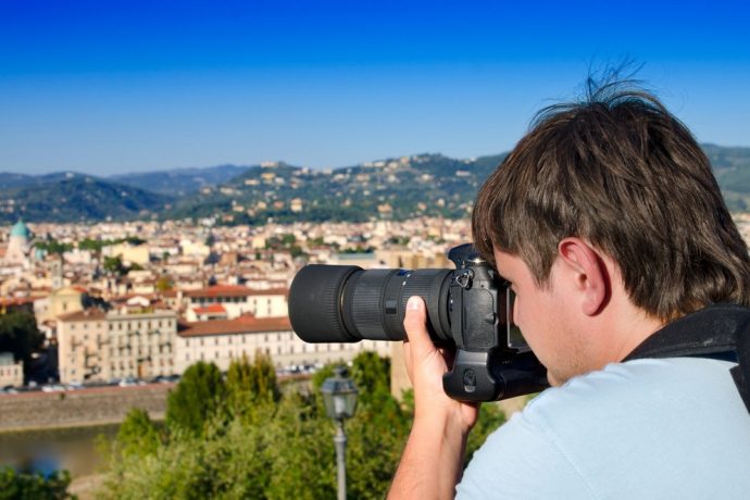 Photographer taking a picture of the scenery