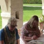 Painting teacher Hugh showing painting group in Venice watercolour techniques