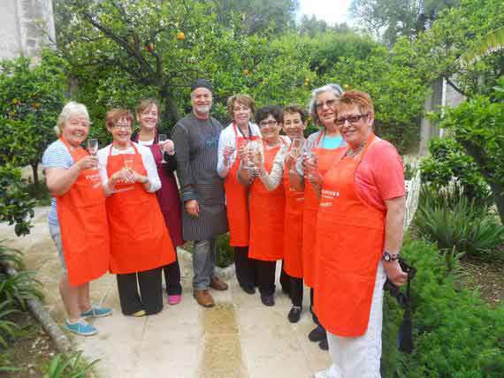 Group of guests with Italian chef in Puglia