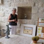 Painting guest presenting her art in Sicily.