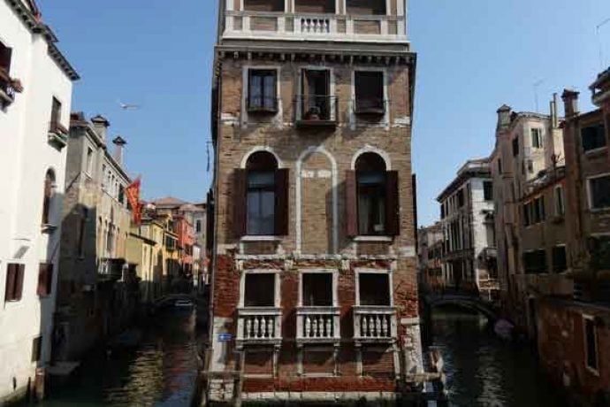Historic buildings in Venice surrounded by the famous canals