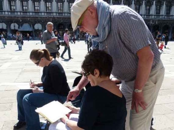 Tutor helping a student in St. Mark's square in Venice