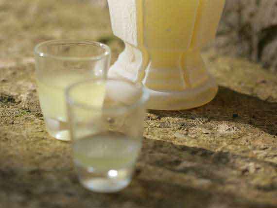 Freshly produced Limoncello with regional lemons. Freshly produced Limoncello with regional lemons.