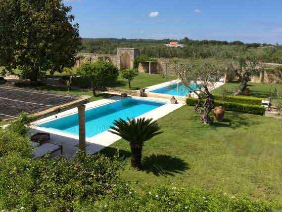 Outside pool and back yard of the historic villa in Puglia. Outside pool and back yard of the historic holiday villa in Puglia.
