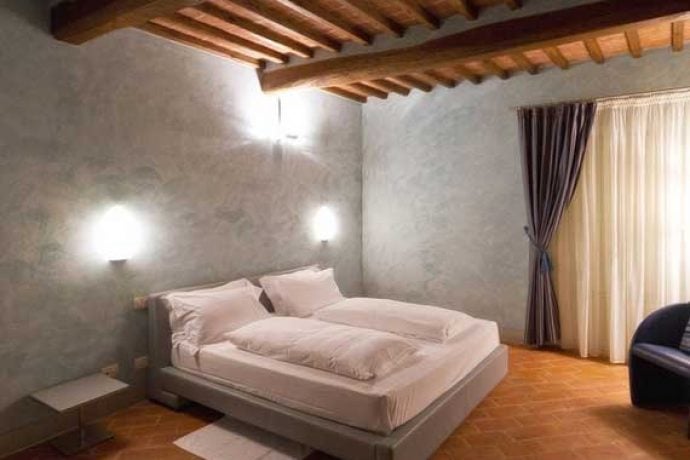 Comfortable double bed in villa casanova