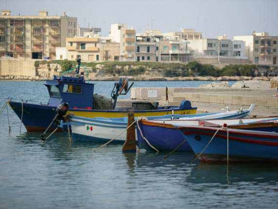 Idyllic harbour in Puglia with boats. Idyllic harbour in Puglia with boats.