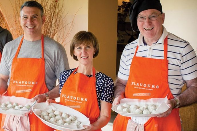 Cooking group in Venice presenting their home-made ravioli in our kitchen.