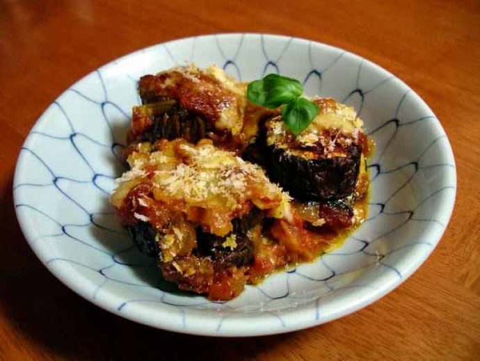 Aubergine parmigiana freshly made on cooking holiday.