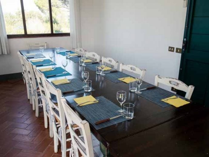 Table ready for cooking guests to eat dinner prepared during course.