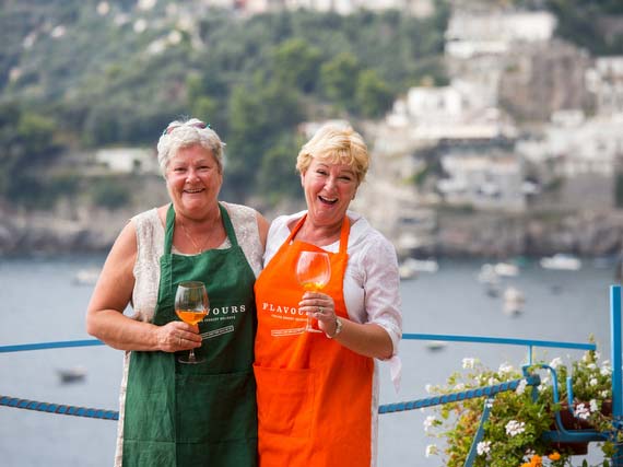 Two single travellers laughing in Amalfi