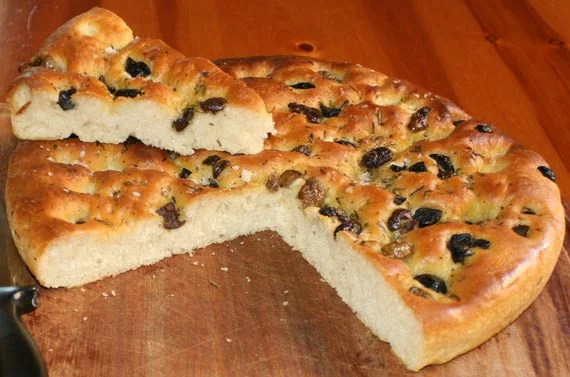 Focaccia bread with herbs and olives 