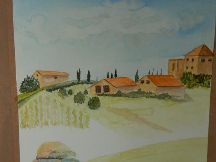 Watercolour painting of Italian houses, hills and cypress trees