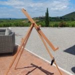 painting in Tuscany with an easel of a landscape