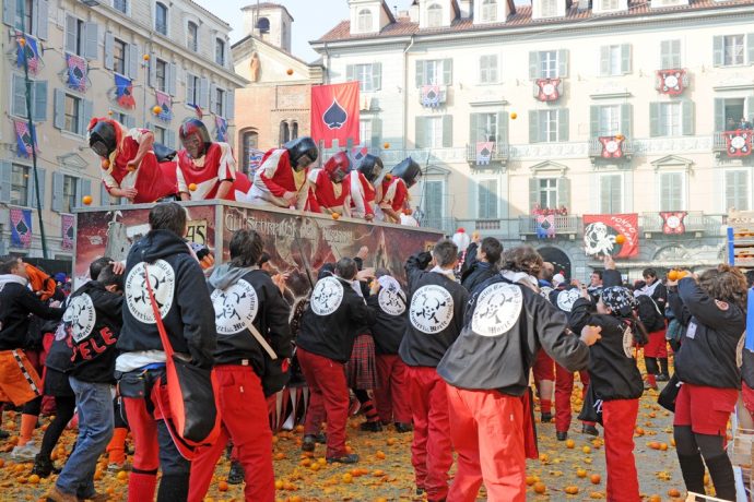 Participants during a orange throwing battle in the Italian town of Ivrea