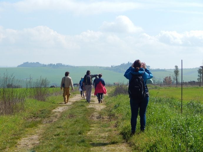 people walking along the Via Francigena in Italy