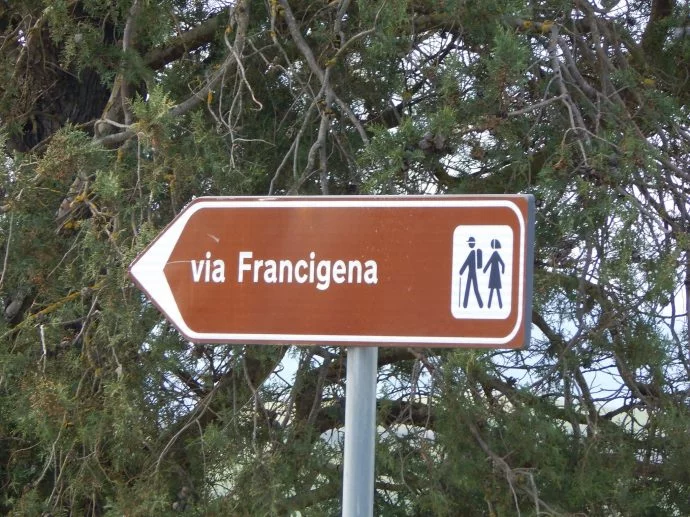 Shows road sign of the via Francigena
