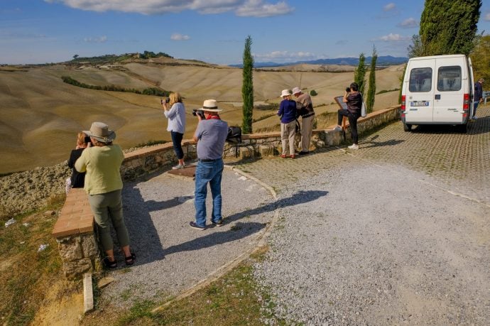 Guests on a photography holiday taking in the Italian landscape