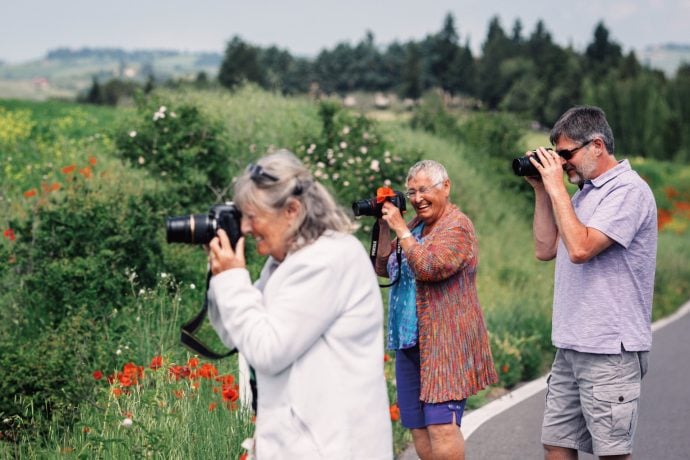 Flavours Holidays guests taking photographs in Tuscany