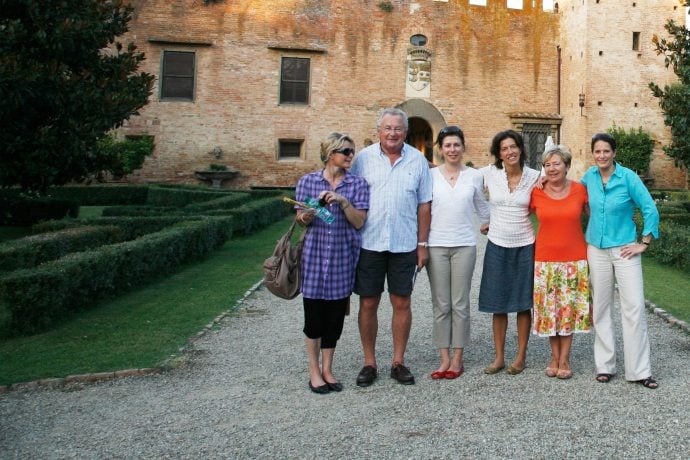 Guests on a language course visiting a historic castle in Italy