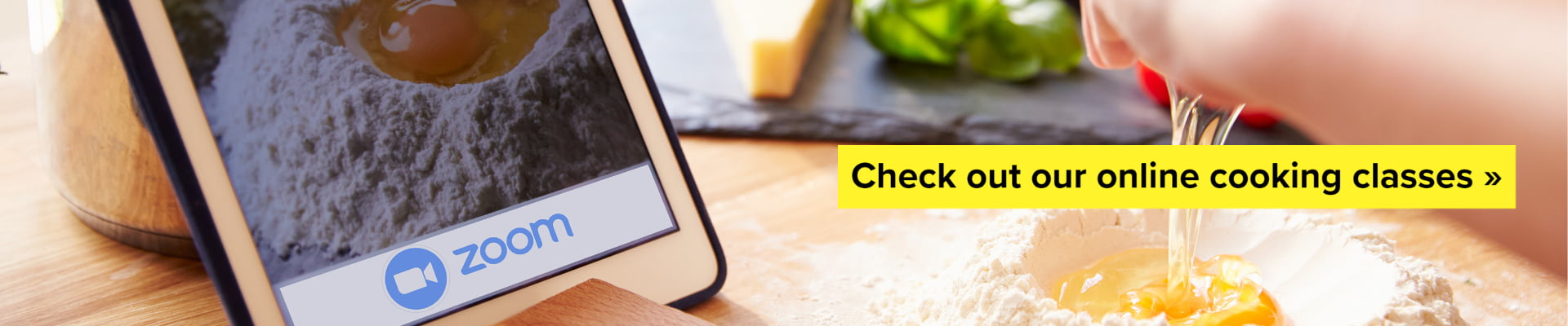 Set up for an online cooking lesson with tablet and ingredients