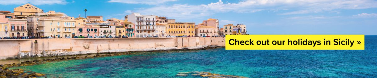 Coast of Ortigia island at city of Syracuse, Sicily, Italy