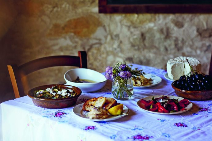 Multiple Sardinian dishes set out to serve on a table