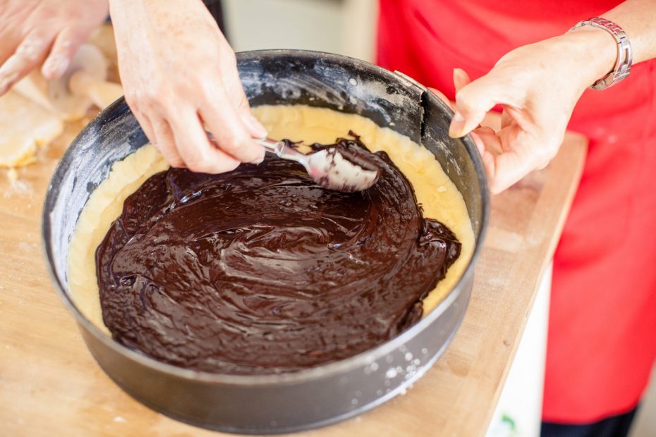 Filling pastry case with chocolate cake mix