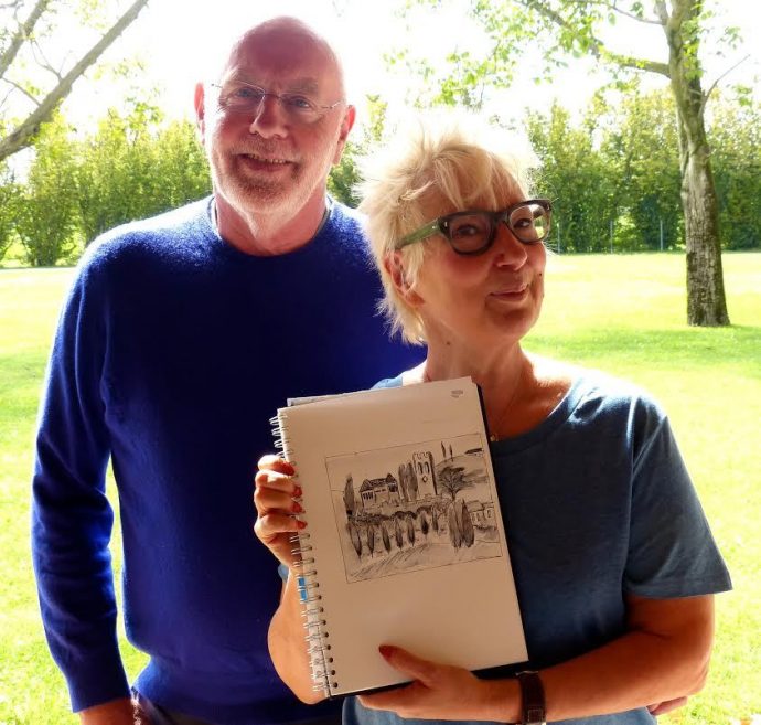 Jenny Eclair and painting teacher, Hugh, with one of Jenny’s paintings