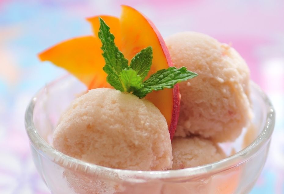 peach sorbet in a glass