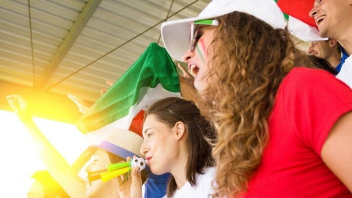 Italian football fans chanting in a stadium