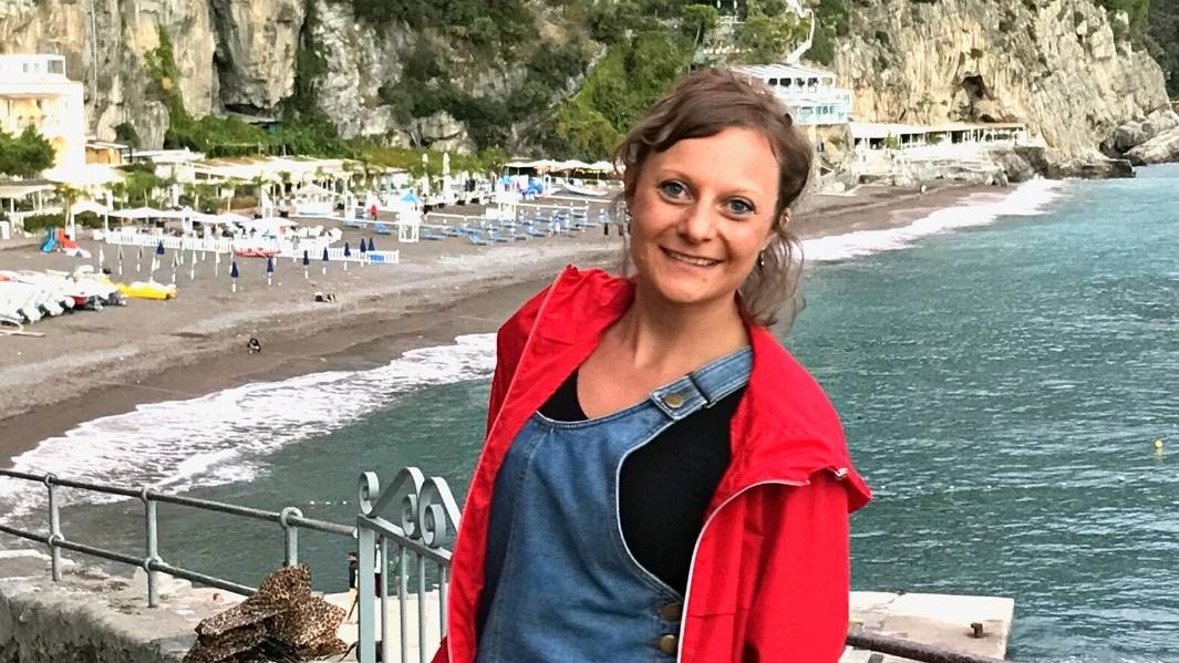 Francesca standing in front of a gorgeous view