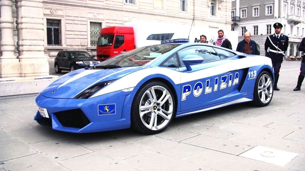 Italian Police admiring their cool Lamborghini