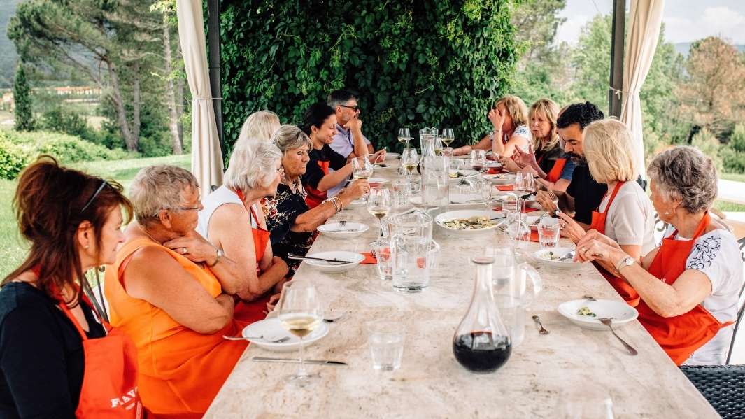 cheerful outdoor friends and family dinner