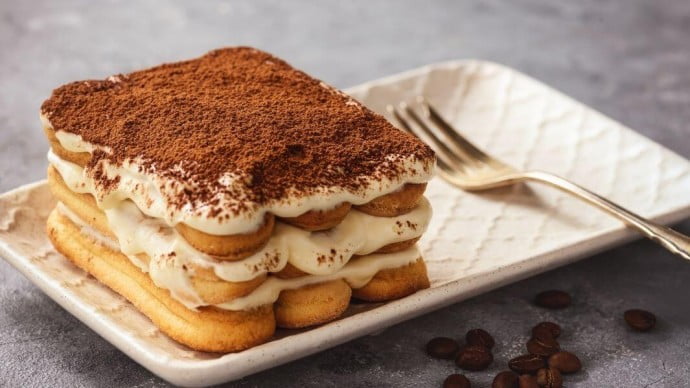 Tasty Tiramisu on a white plate