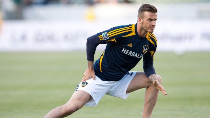 David Beckham stretching before a football match