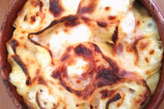 Baked pasta roses in a skillet