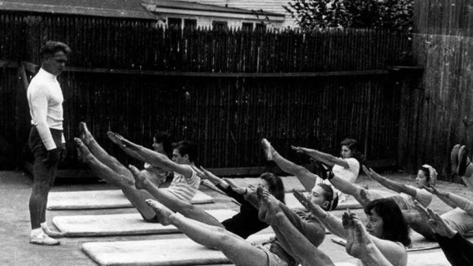 Joseph Pilates teaching pilates students outside Joseph Pilates teaching pilates students outside