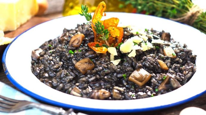 Squid ink risotto in a bowl