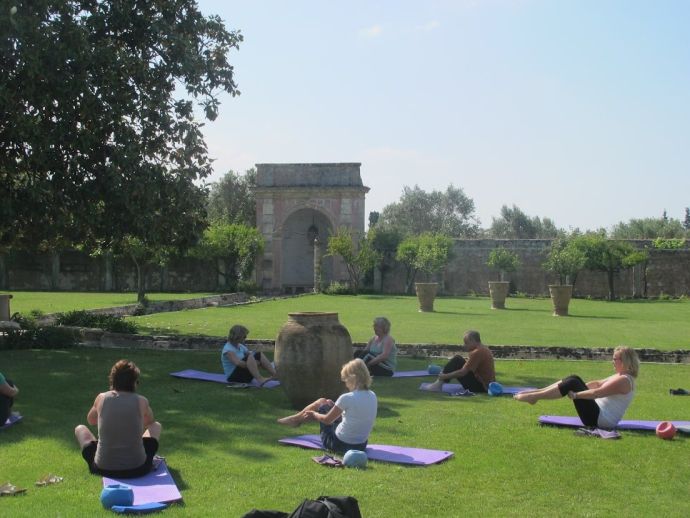 A group of women bonding over a lesson in the sun