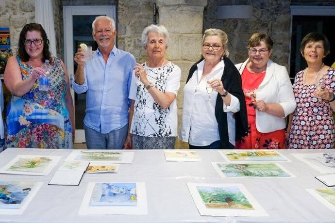 Guests on a Flavours Holidays showing art work 