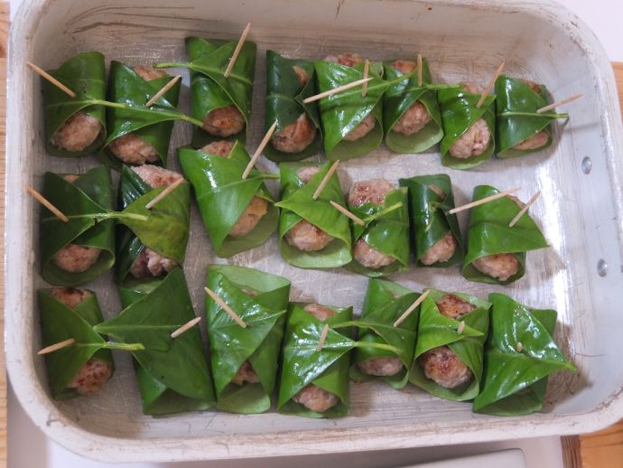 Sicilian meatballs in lemon leaves