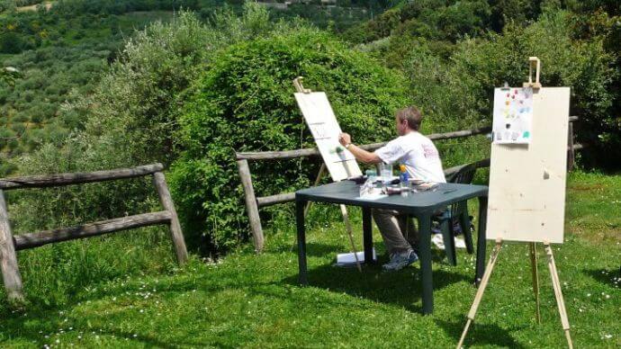 A man taking in the Tuscan views with beautiful surroundings