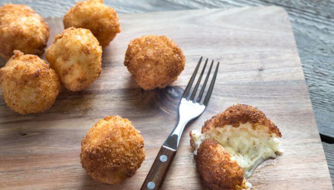 a plate of Sicilian Arancini to go with some Sicilian wine