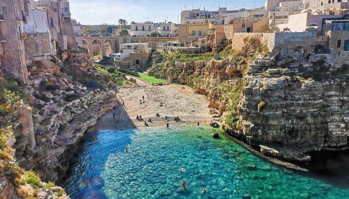 Tourists by the sea in Puglia