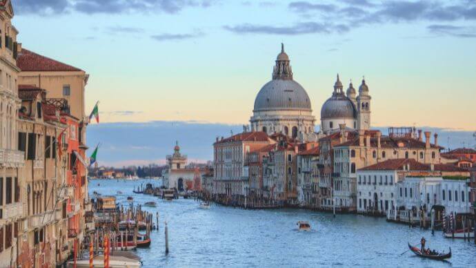 A photograph of the Venetian canals from the Rialto bridge