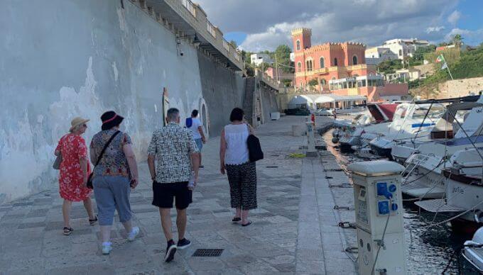 A group of travellers appreciating Italy's culture